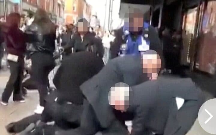 Five men restrained Yves Sakila for nearly five minutes.