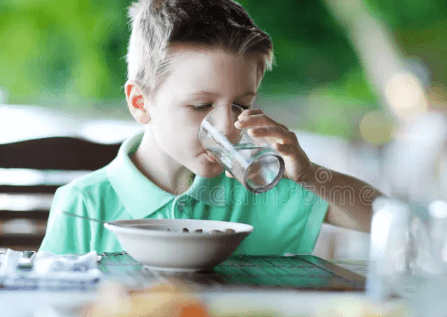 Should You Drink Water While Eating? Doctors Weigh In