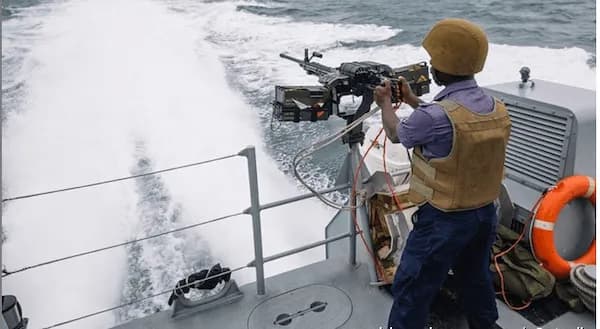 Nigerian Navy Hands Two Suspected Impostors to Cross River Police After Arrest by NNS Victory